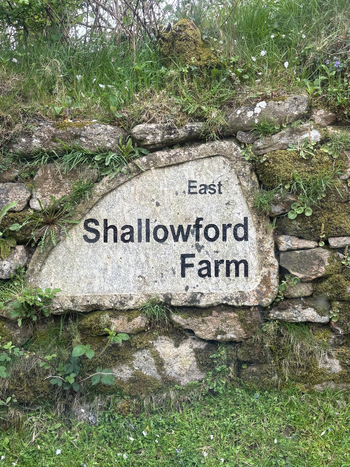 Shallowford Farm sign on a wall